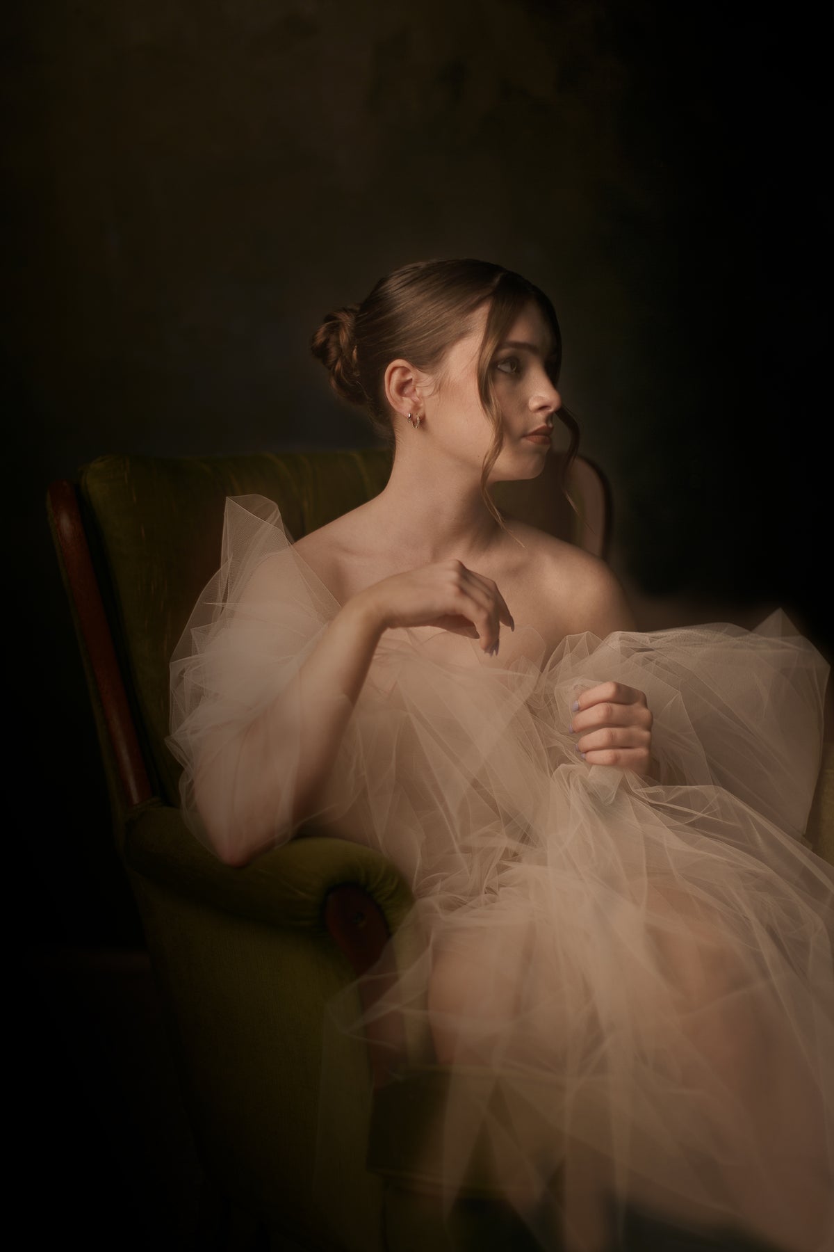 Legacy Couture Portraits are private fine art portrait commissions that combine authored couture garments, sculptural lighting, and intentional portraiture to honour a woman’s meaningful life chapter.